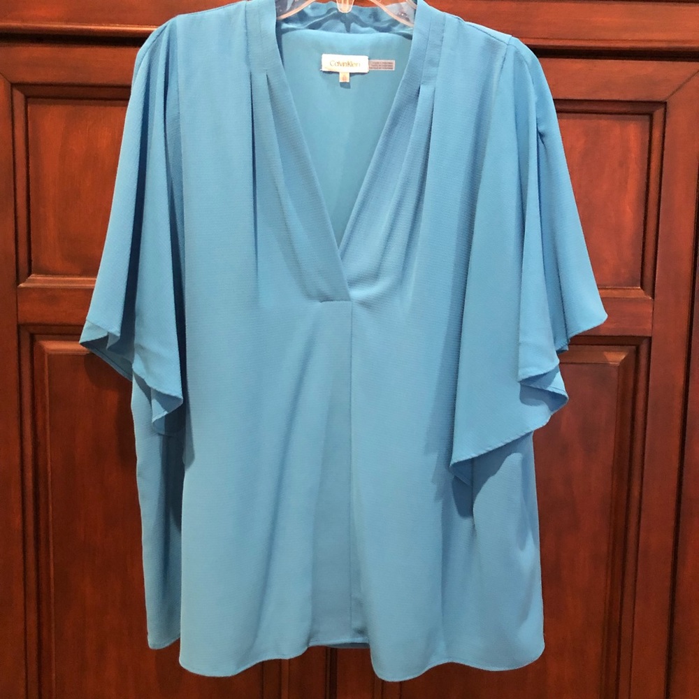 Calve Klein Top - XL  this short has never been worn.  NWOT